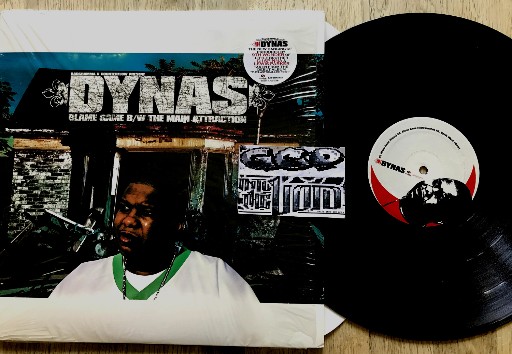 Dynas-Blame Game BW The Main Attraction-VLS-FLAC-2004-THEVOiD