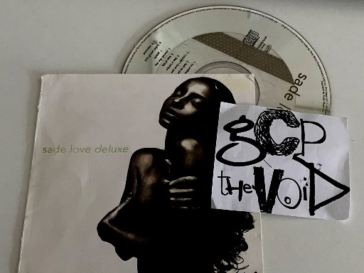 Sade-Love Deluxe-CD-FLAC-1992-THEVOiD