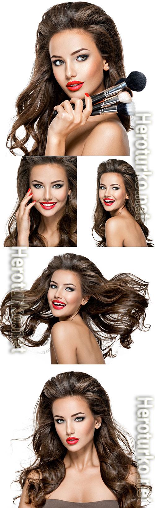Luxury girl model with red lips and makeup brushes Luxury girl model with red lips and makeup brushes