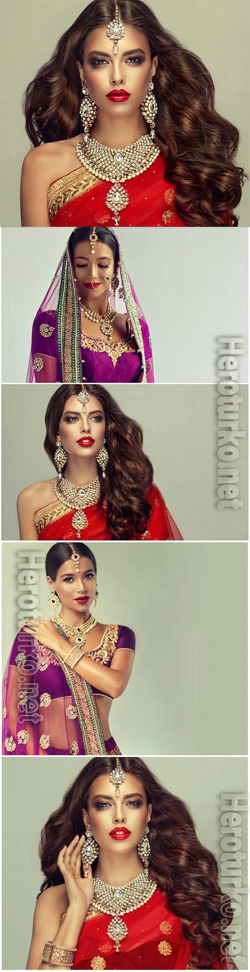 Luxurious indian girls in traditional dresses stock photo Luxurious indian girls in traditional dresses stock photo