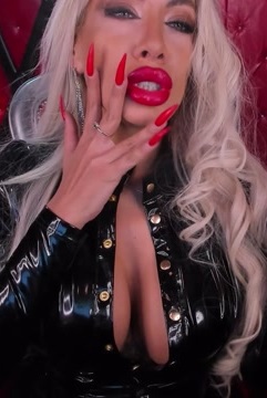 Red long nails and lips mesmerize with a cigar
